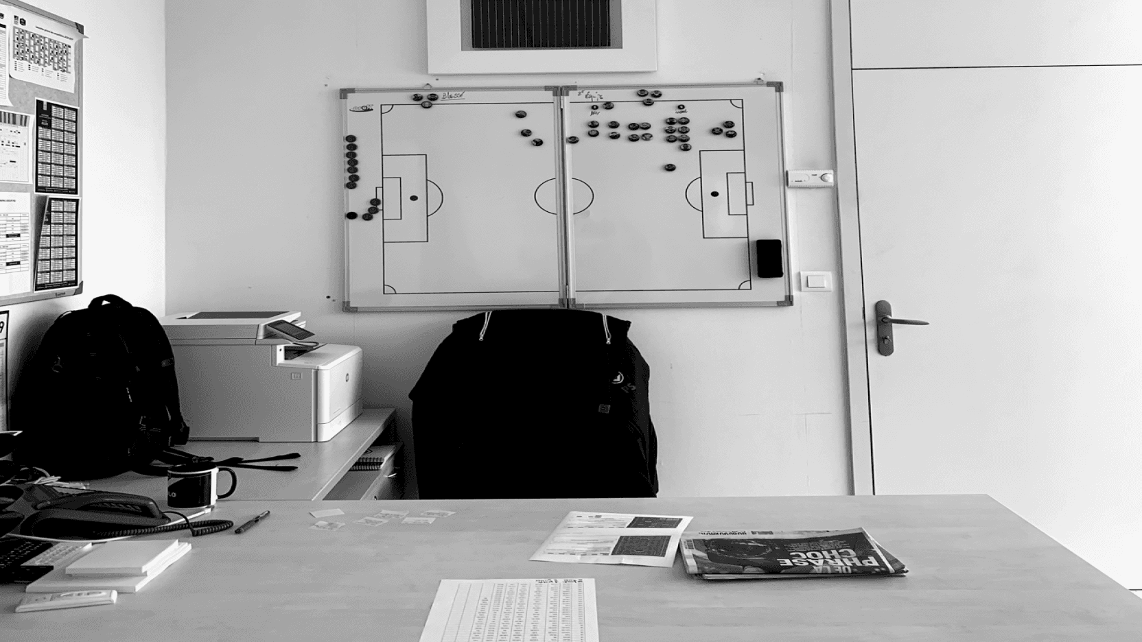 A magnetic tactics board on an office wall.
